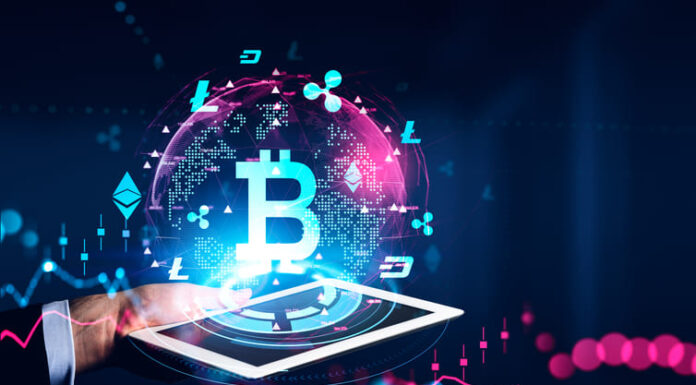 Man hand holding tablet. Screen and cryptocurrency hud hologram with bitcoin and graphs