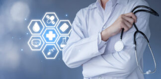 How Bioprocessing Technologies Are Adapting to Support Individualized Therapies Hand of doctor hold a stethoscope with health icon.