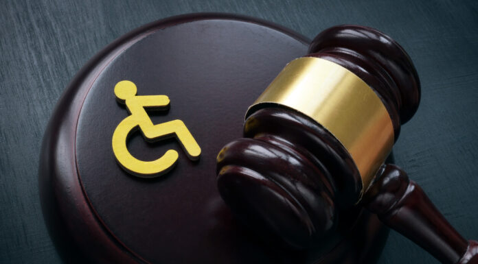 Disabled person sign and gavel.