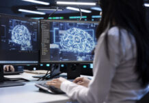 The Role of Generative AI in IT Service Management (ITSM) Programmer using AI tech on computer to do maintenance in server room providing storage.