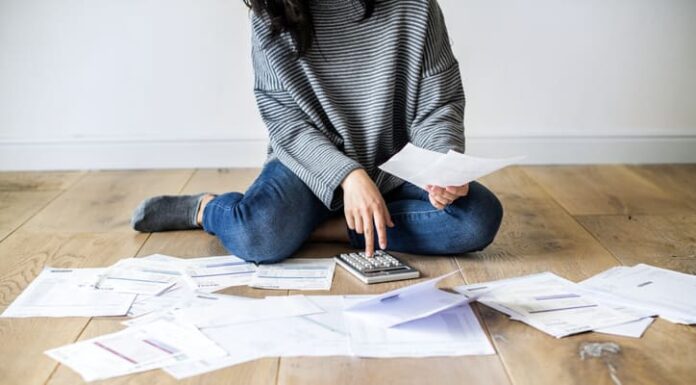 Taking Control of Your Debt Woman managing the debt