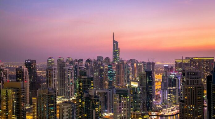 Apartments for Sale in Dubai: Top Tips for First-Time Buyers aerial view of City lit up at night