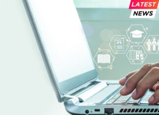 Hands of a man typing on a laptop keyboard Business Team