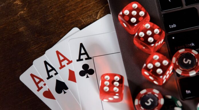 Which Online Casino Deposit Bonuses Are Available in Australia? Red dice, cards and chips on computer