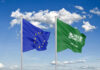 Public Investment Fund of Saudi Arabia: Green Technologies Projects and Other Partnerships with EU Thick colored silky flags of European Union and Saudi Arabia