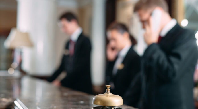 Hotel service bell at reception counter desk