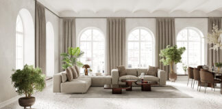 Monteurzimmer in Linz: Affordable Accommodation for Workers and Travelers Large living room inderior with arch windows, furnished with modern sofa and dining table