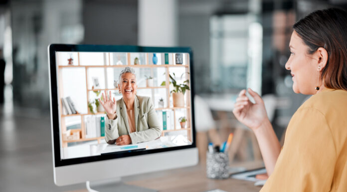 Benefits of Hiring a Virtual Coach Video call, computer and business women wave in offic