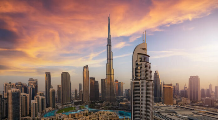 Panoramic sunrise view of the downtown district skyline of Dubai