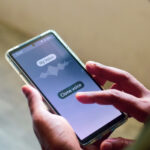 Man using mobile applications for cloning his voice