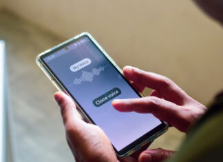 Man using mobile applications for cloning his voice