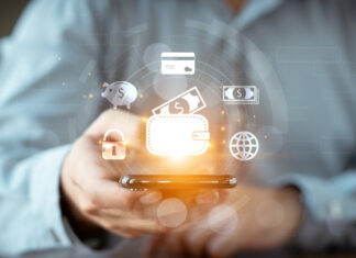 Businessman Hand Using Mobile Phone to Connect Digital Wallet.