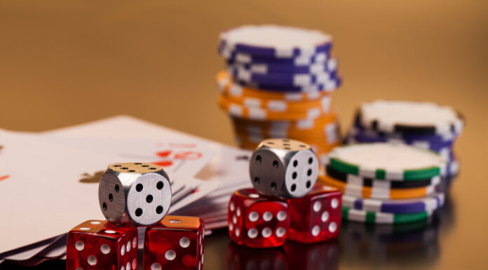 Roll the Dice Right: Finding Europe’s Top Casinos for Fair Play and Fast Payouts set of playing card with dices on reflective table