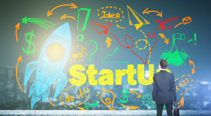 The UAE’s Top Incubators and Accelerators for Tech Startups Back view of man on concrete rooftop looking at abstract space ship sketch