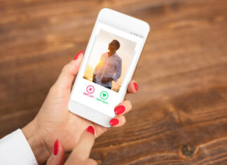 Woman using dating app and swiping user photos