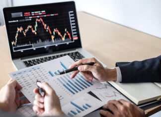 Business team on meeting to planning investment trading project and strategy of deal on a stock exchange with partner, financial and accounting