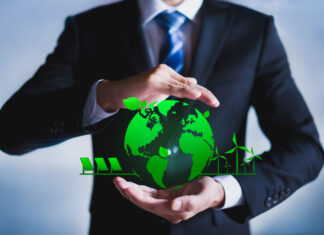 Businessman with a green globe
