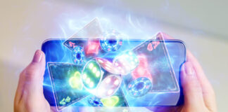 Breaking Business Stereotypes: How the Gaming Industry is Redefining Traditional Business Norms in a man's hand a smartphone with playing cards neon, roulette and chips, neon background