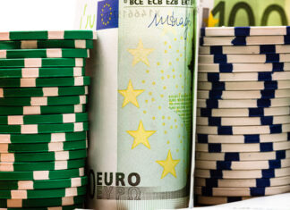 Poker casino chips and money close up
