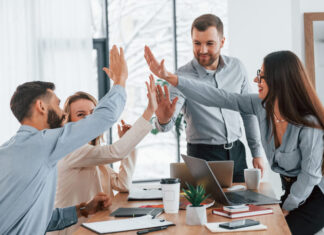 Behaviour Change from the Top-Down, the Middle-Out and the Bottom-up: How to Drive Culture Change at All Levels – And why it’s so Important Group of business people that working on the project in the office