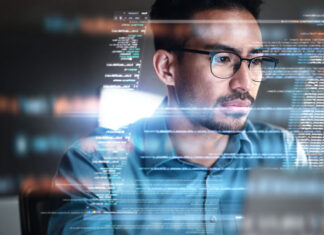 Programmer, coding and man with focus, hologram and data analytics with cyber security