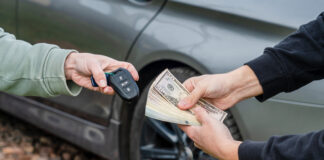 Legalities of Buying Second Hand Cars in Dubai by Expats Exchange money and car keys