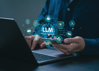 The Road Ahead for Large Language Models is Brighter than Claimed AI Large Language Model concept. Businessman holding a smartphone with LLM icons on virtual screen