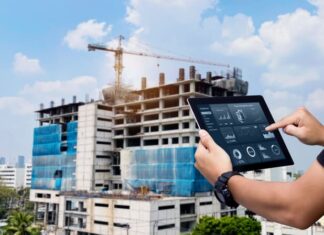 Revolutionizing Construction Management: Integrating IoT with Scheduling Software for Real-Time Monitoring Smart Construction Project management system