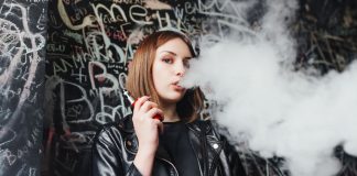 Exploring the Variety of E-Liquids Available in Irish Vape Shops Woman using e-liquid vape