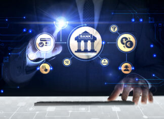 Private Banking: AI-Enhanced Advice, New Asset Classes, Wealth Super Apps: Six Wealth Management Trends for 2025 Businessman touching screen with about Banking