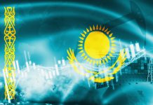 How Kazakhstan is Contributing to Global Energy Security and Supply Chains Kazakhstan flag, stock market, exchange economy and Trade, oil production, container ship in export and import business and logistics