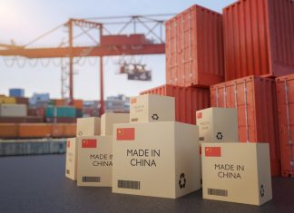 Many chinese cargo containers and cardboard boxes. Importing goods from China