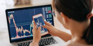 What is Crypto Trading API, and How Does It Work? Woman crypto trader investor broker using smartphone app and laptop executing financial stock trade market trading order to buy or sell cryptocurrency - API