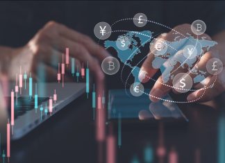 Forex Trader using mobile phone with trading graph, currency exchange and global currencies on virtual screen