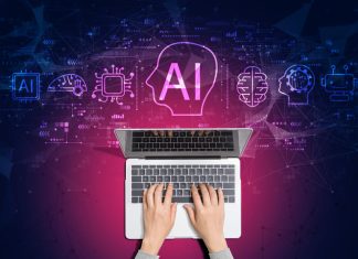 Prioritising User Security: What Makes Business Competitive in The Age of Data-Hungry Marketing Person using laptop with AI and data