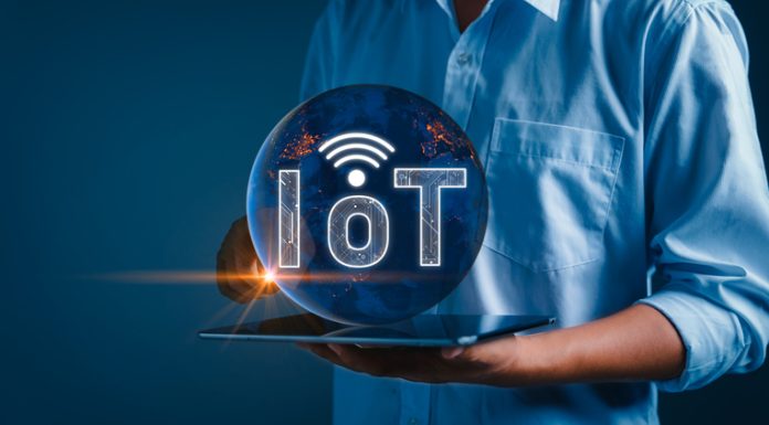 Revolutionising Connectivity: IoT Platform and Software Development Businessman with speed communication technology in the future.