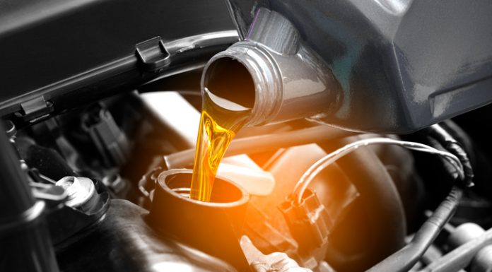 Car Engine Oil: A Mechanic’s Guide to Why It Works Refueling and pouring oil quality into the engine motor car Transmission and Maintenance Gear