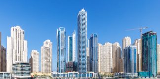 Dubai Real Estate Market 2025: Trends and Opportunities for Savvy Investors Dubai Marina skyline cityscape with yachts skyscraper buildings living at water