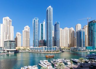 Dubai Marina skyline cityscape with yachts skyscraper buildings living at water