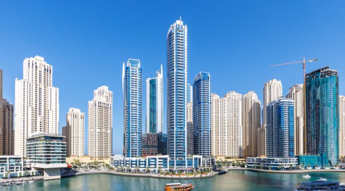 Dubai Real Estate Market 2025: Trends and Opportunities for Savvy Investors Dubai Marina skyline cityscape with yachts skyscraper buildings living at water