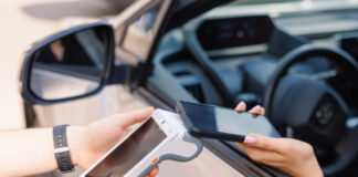 The Role of E-Challans in Promoting Safer Driving Habits in Bangalore girl driver makes NFC payment with her mobile phone, contactless payment method for services