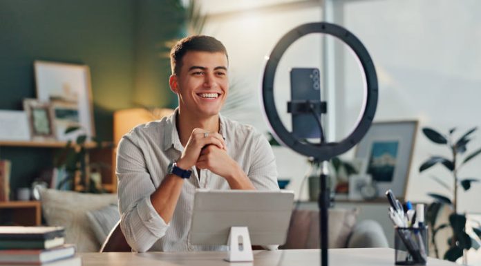 For Creators, the Creator Economy is Just Getting Started in 2025Â content creator with smartphone for social media or online vlog and live streaming.