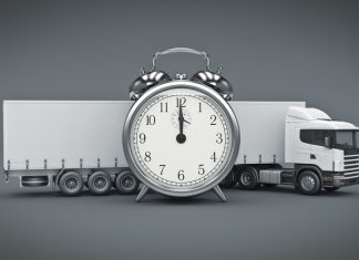 White truck with clock for delivery