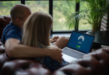 Cybersecurity Trends for 2025: The Predictions By IBM Couple using laptop with VPN on screen