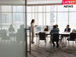 team talking at meeting table