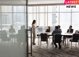team talking at meeting table
