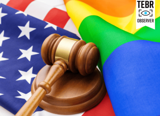 Image of a LGBT rainbow flag and American Flag