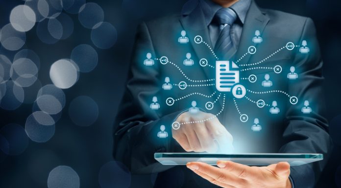 Businessman holding a tablet for Corporate data management system