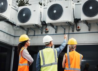 HVAC technician working on a unit