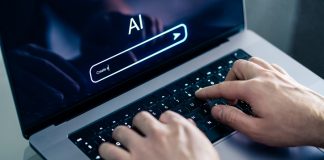 Why Sticking to Gemini for Meetings Might Limit Your Options Man using chatbot with laptop at work. Creative content. Generate text or image. Command input on website.